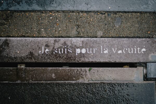 A bench that has writing on it